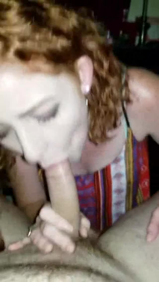 Cute college redhead gives a blowjob and swallows the load