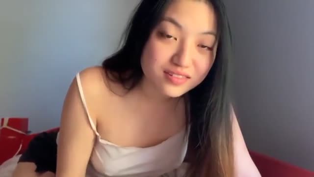 Submissive asian beauty takes a facial and gets fucked after