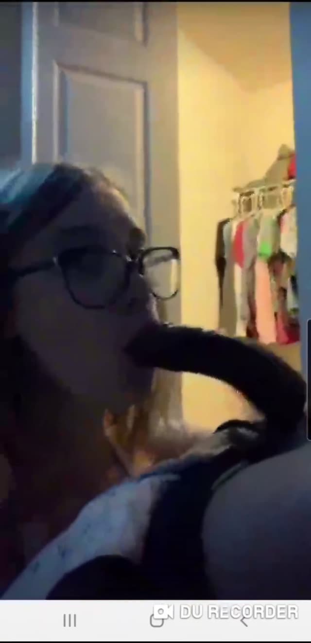 Wonderful nerdy girl in glasses sucking black cock