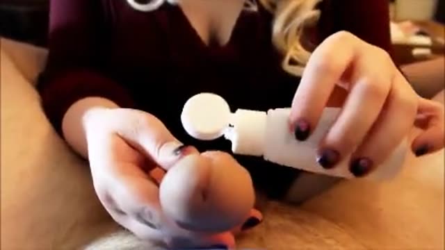 Blonde milf giving a sensual handjob to her friend
