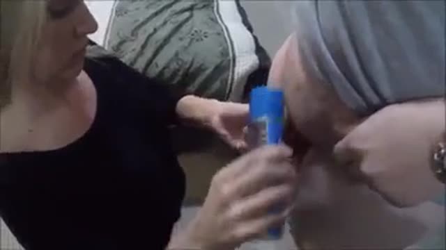 Milf gets a double facial from 2 buddies
