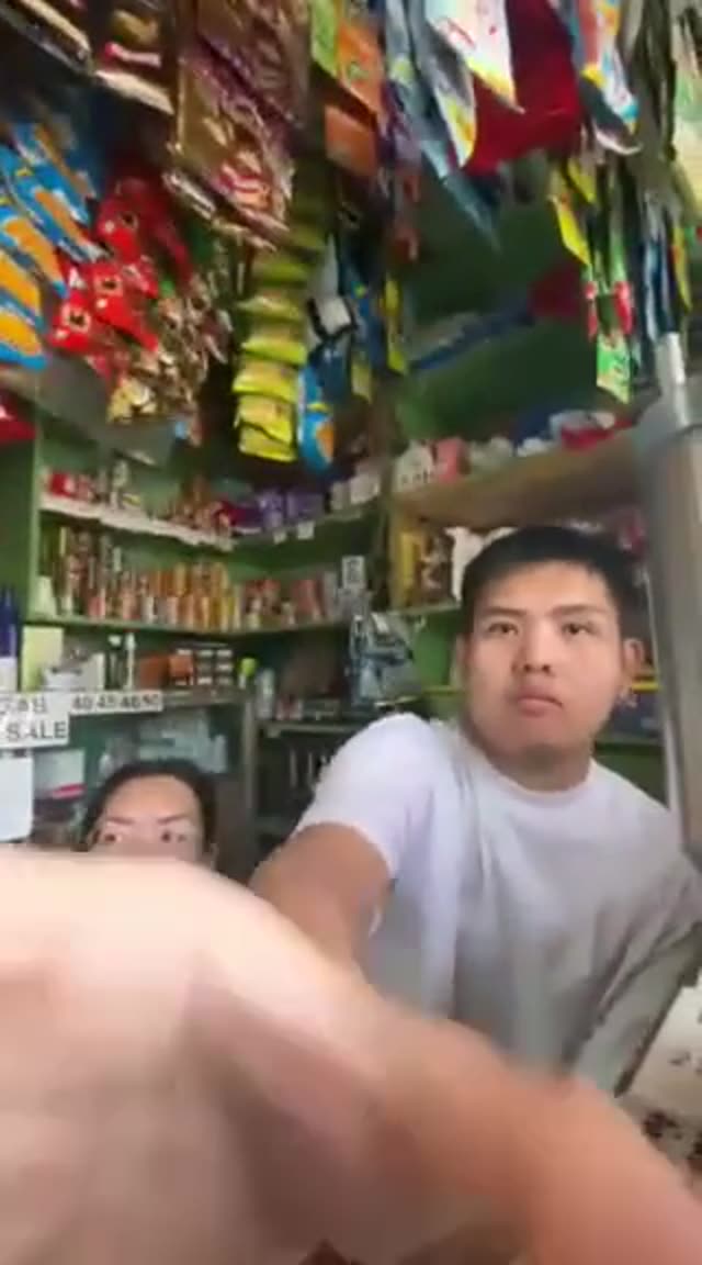 Asian gets blown while working cash register