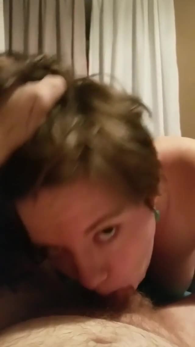 Cute brunette sucking his dick good