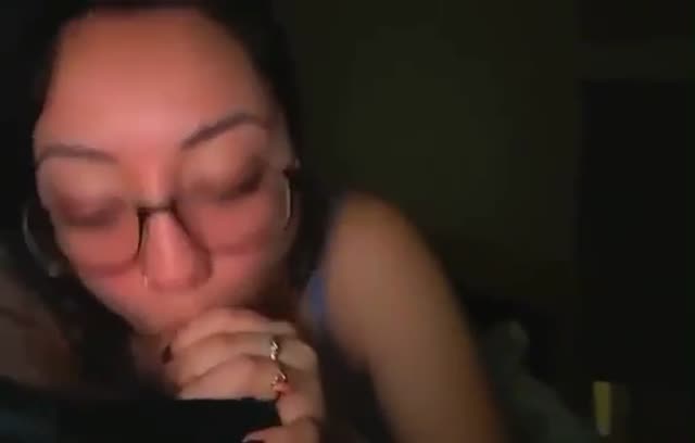 Sexy nerd in glasses giving head