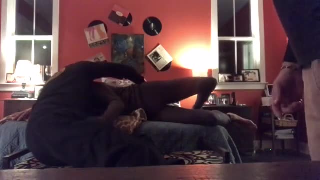 Senior citizen films his wife with black bull