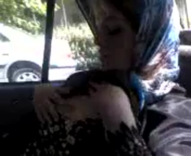 Pregnant Woman Showing off her boobs in the Car