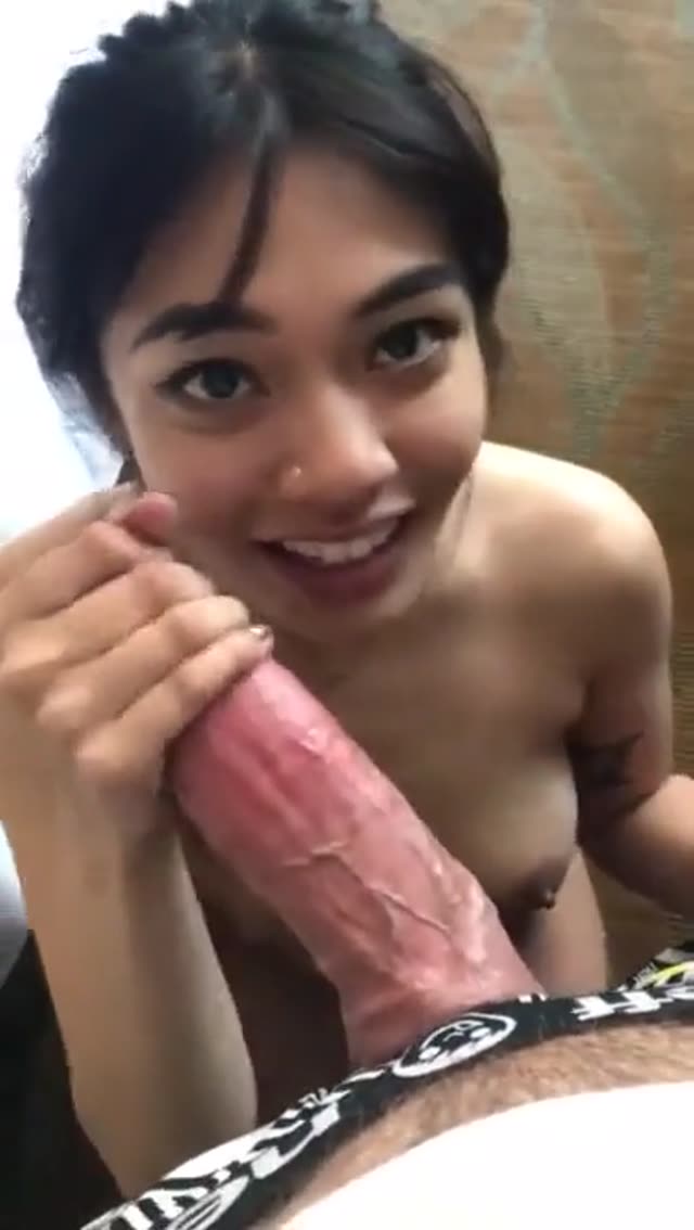 Asian beauty worships big white cock